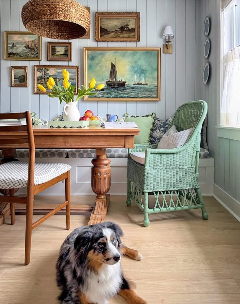 beautiful green breakfast space with sconces